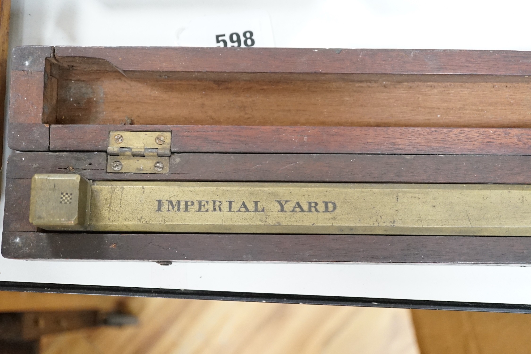 A boxed brass Buckingham District 1841 Imperial yard measure, box 99.5cms long